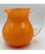 Strawberry Street Glass Pitcher Orange With Clear Handle 10 Round Belly - $19.87