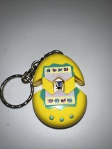 Tamagotchi  1997 Keychain McDonalds Toy Yellow - $13.99