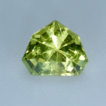 Natural Greenish Yellow Sapphire | Modified Trillion Cut | 6.63x5.11 mm | 1.02 C - £525.25 GBP