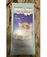  Porcelain Angel on A Cloud Item #50528 (With A Bear) - $37.35