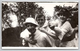 RPPC Woman with Men Playing Around Having Fun All Smiles for Photo Postcard B30 - £4.75 GBP