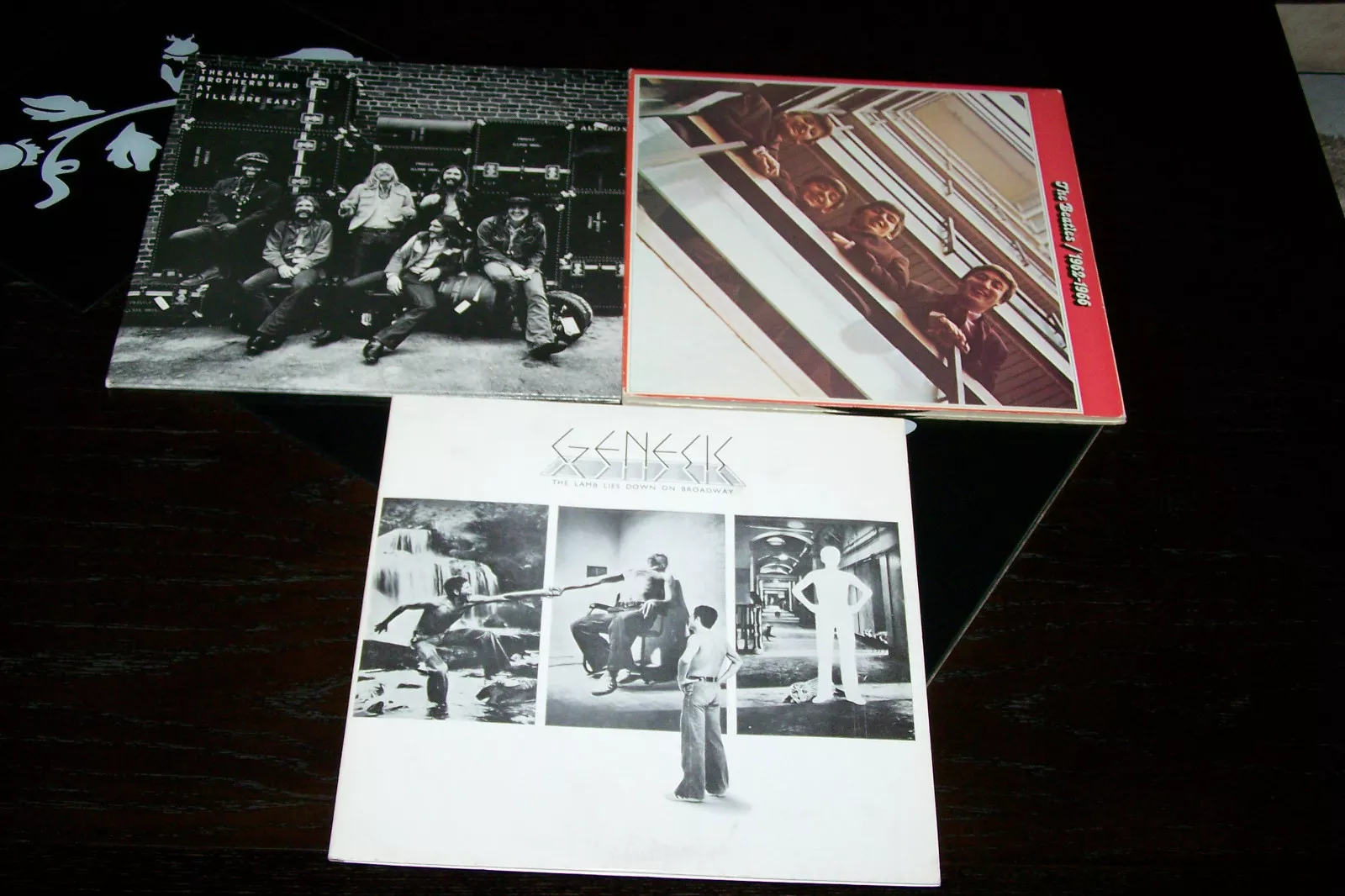 3 2LPS FROM:BEATLES GENESIS THE ALMAN BROTHERS BAND - $108.90