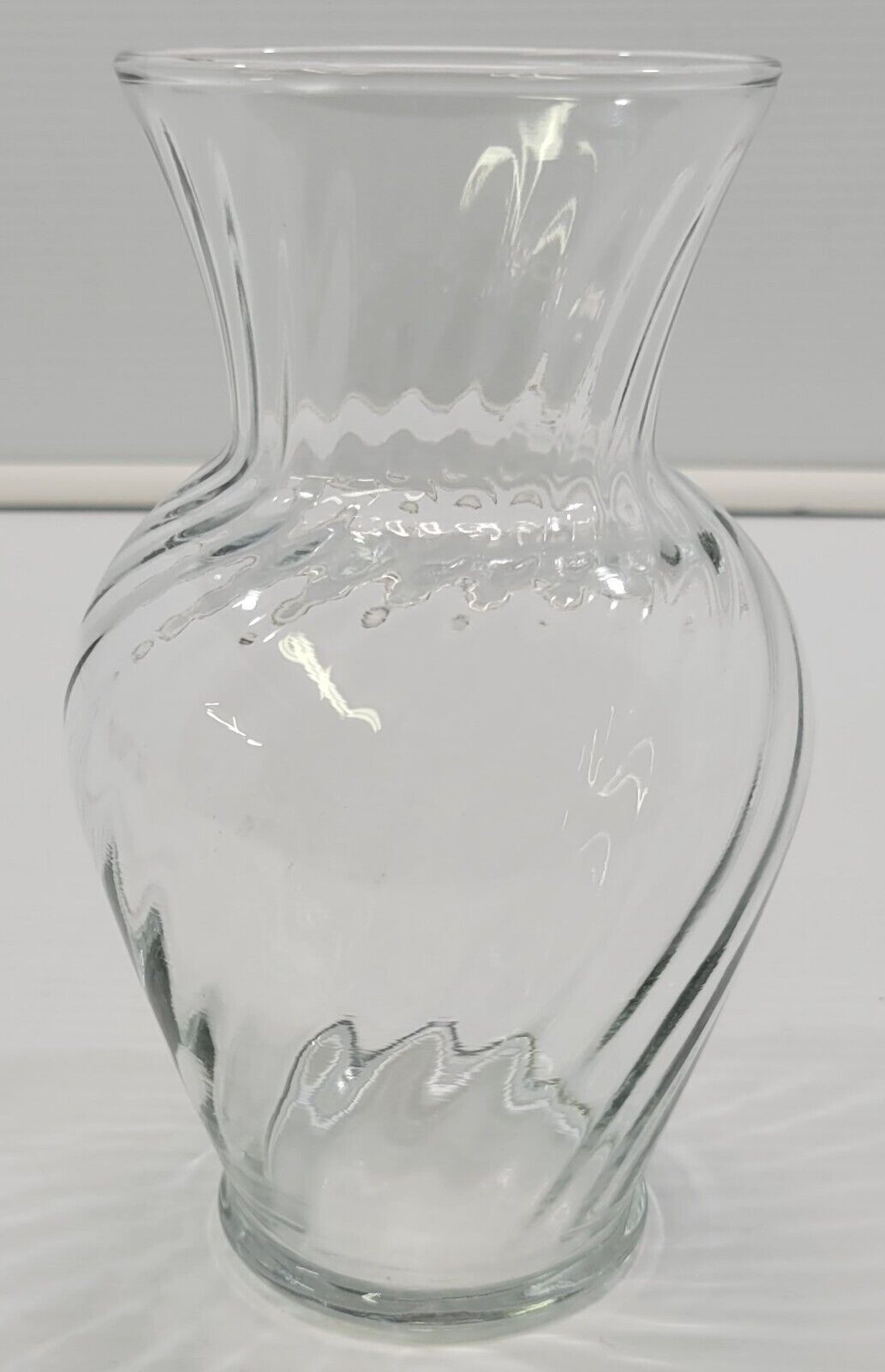 AP) Indiana Glass Company Optic Swirl Clear Flower Vase 7" Tall - $9.89