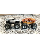 2 Monster Jam  4 x 4 Trucks Includes Hot Wheels Prowler &amp; N.E.A. Police. - $8.09 CAD