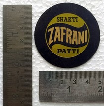 SHAKTI Zafrani Patti vintage Publicité Litho Tin Small Coaster 5 cm de... - £19.39 GBP