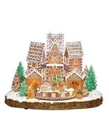 10.25&quot;H LIGHTED MUSICAL TOWN GINGERBREAD; ROTATING TRAIN - $247.45