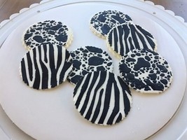 Animal printed fondant cupcake toppers.  - $15.00