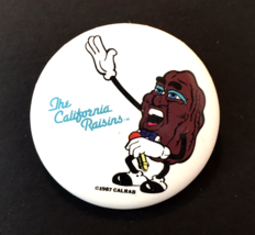 The California Raisins pin-back button Singing Raisin with Microphone - £3.95 GBP