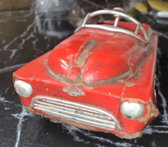 ? JOUSTRA ? VOITURE TOLE ROUGE ?? - $9.78