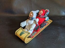 Byers Choice 3 Toddlers on Wood Toboggan Sled Red Green White Snow Suit - $3,167.92 MXN