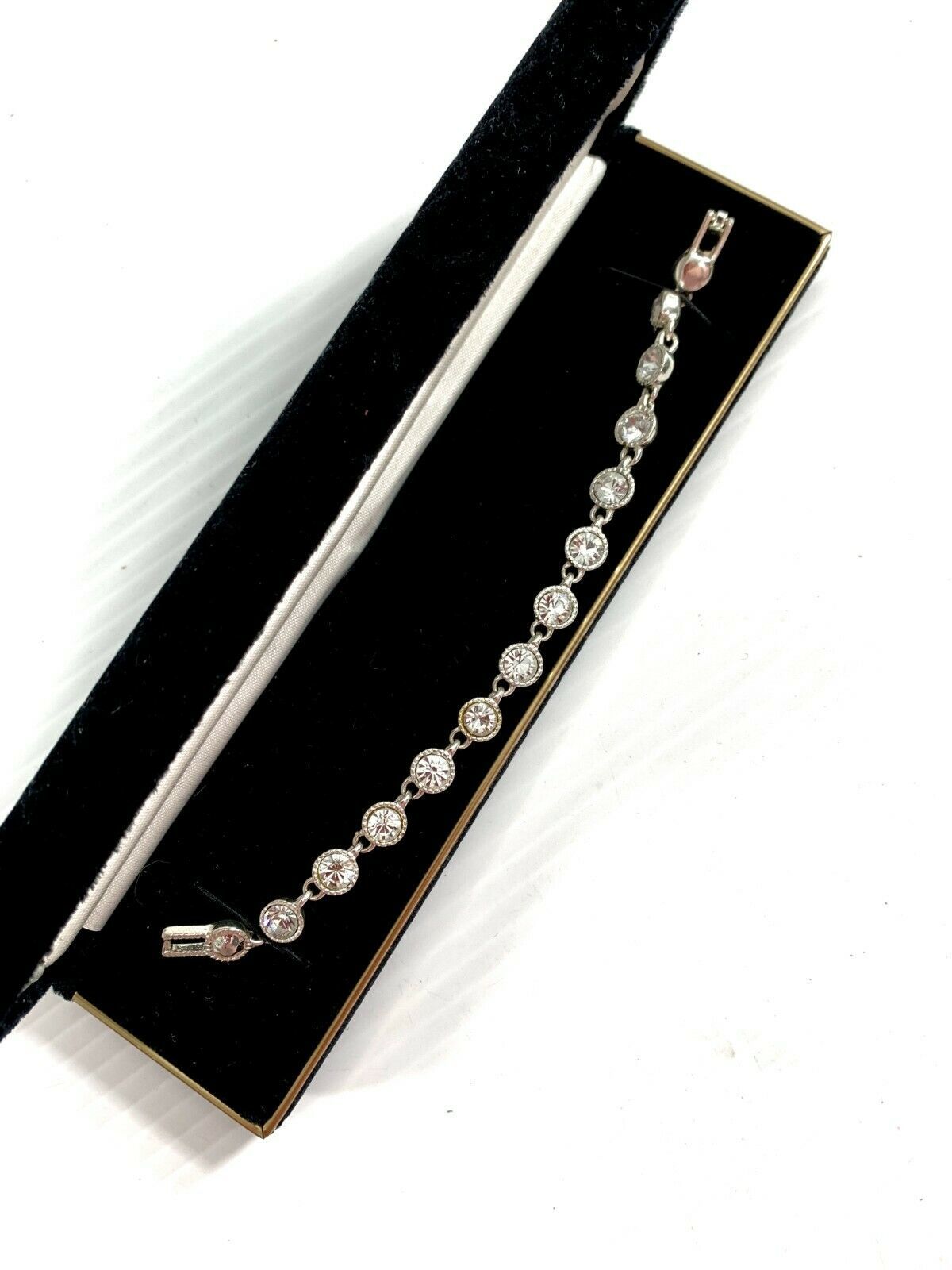 Primary image for Vintage 1980s Avon SAQ Faceted Crystal Tennis Bracelet Silver Tone Bling