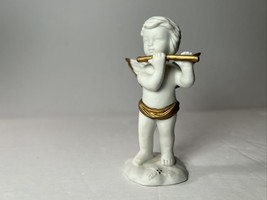 RUSS angelic treasures porcelain angel figurine BOY PLAYING FLUTE - $4.99