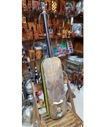 The Guembri, known as the Sintir, is a traditional Moroccan musical inst... - €218,73 EUR
