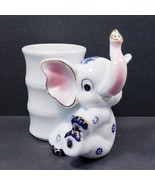 Small White Trunk Up Elephant Bamboo Planter - $26.07