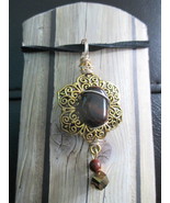 Mahogony Obsidian and brass pendant. - $20.00