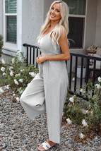 Black Stripe Half Buttoned Sleeveless Wide Leg Jumpsuit - $308.61 MXN