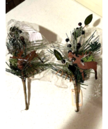 2 small winter Greens stems with tin deer - $34.17 CAD