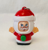 Santa Claus interactive toy clip keychain Christmas ornament spinning faces - $10.00