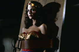 Lynda Carter in Wonder Woman strapped tied down to table 18x24 Poster - £18.78 GBP