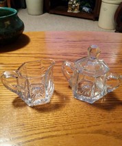 029 Cut Glass  Cream and Sugar Set. Star/Flower Pattern On the Bottom - £15.74 GBP