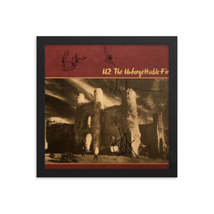 U2 signed &quot;The Unforgettable Fire&quot; album Reprint - £59.61 GBP