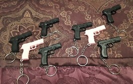 His or Her&#39;s Collectible Taurus 9MM Gun Keychains 2012 Shot Show Las Vegas - $7.99