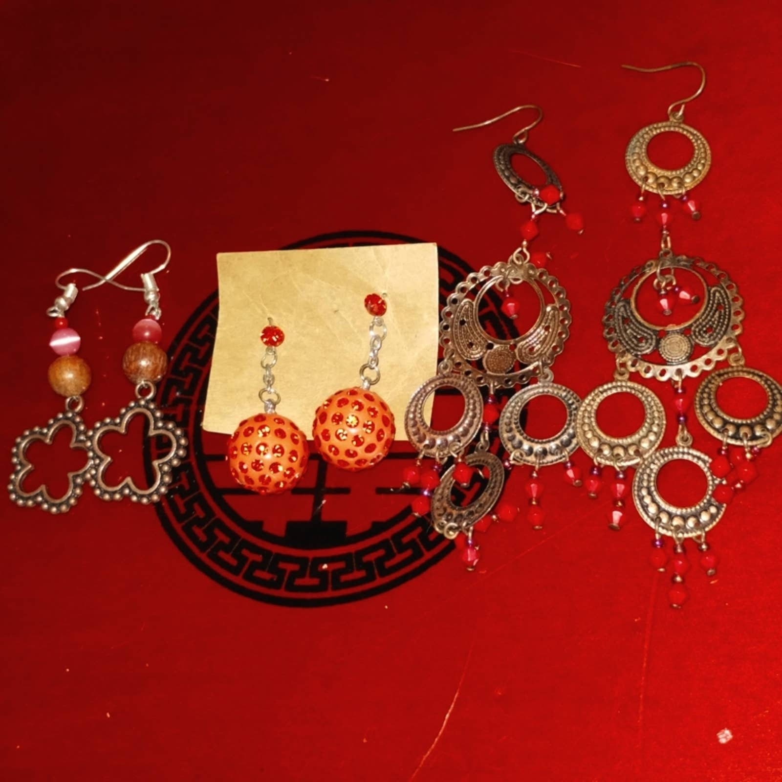 Three pair of really beautiful vintage pink and silver earrings - $17.82