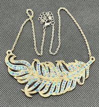 Cookie Lee Crystal Floating Feather Brass Tone Necklace - £11.56 GBP