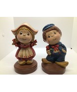 dutch boy and girl figurines vintage - $423.47 MXN