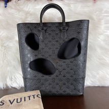 Louis Vuitton Rei Kawakubo Empriente Monogram “Bag With Holes” Tote MM - $6,800.00