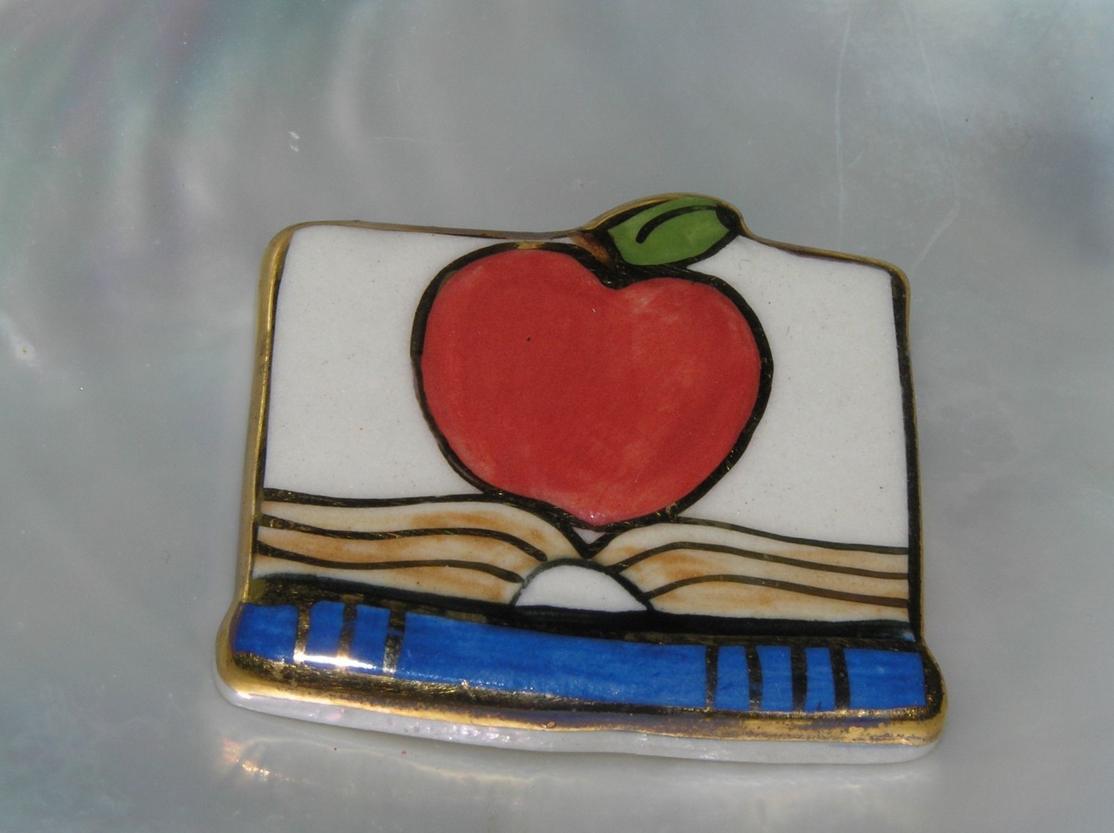 Estate Painted Ceramic with Gilt Accents Red Apple On Open Book Teacher Pin - $8.59