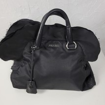 Authenticity Guarantee

PRADA Womens Handbag Black Tessuto Nylon Ruffle Trim ... - $549.43