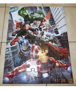 Avengers Assemble Puzzle in iron Man Tin - $187.08 MXN