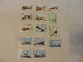 Lot of 14 Mozambique Stamps Ships, Hunting, Musical Instruments, from 1981 - $14.00