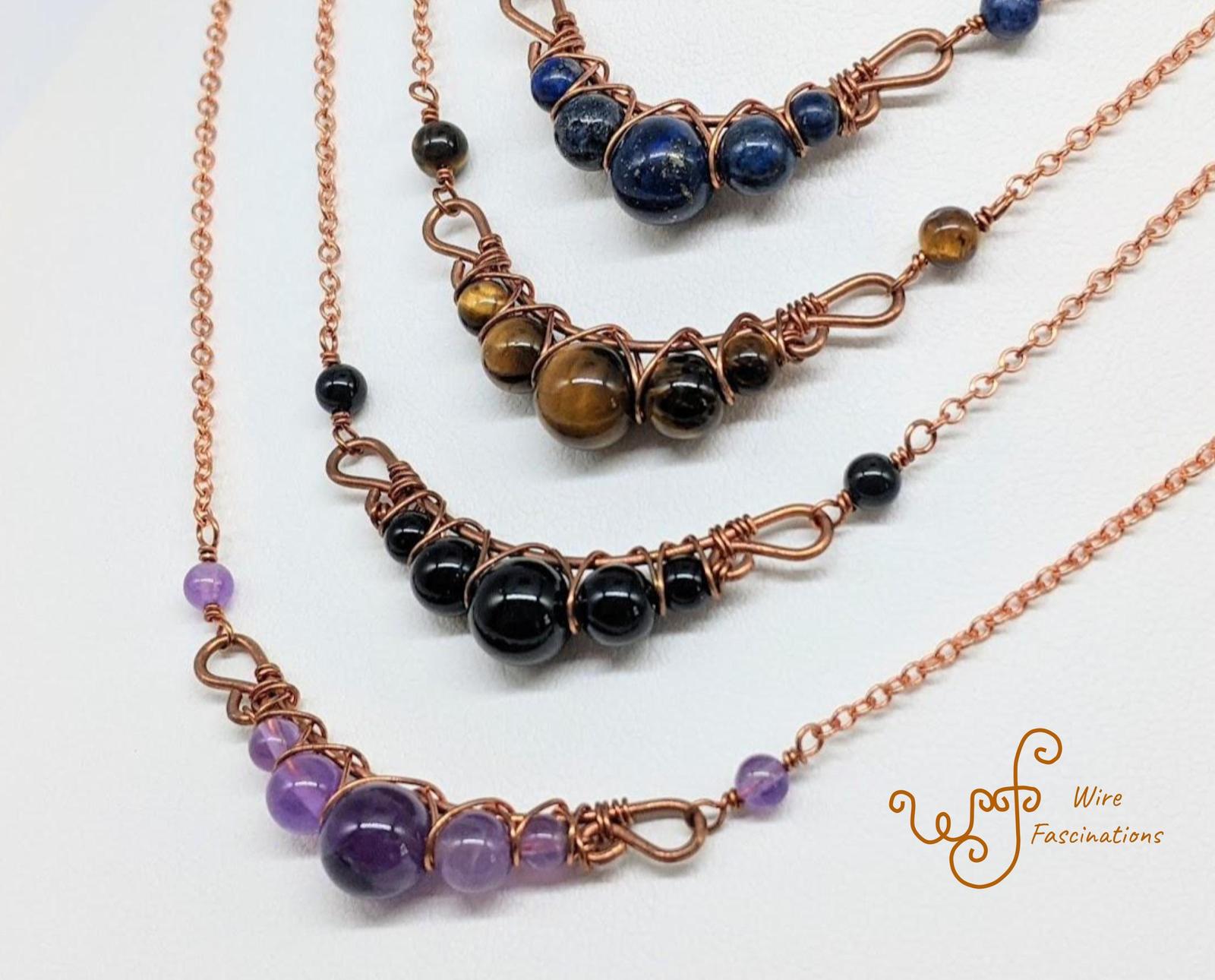 Handmade copper necklace: criss cross copper wire wrapped round stones - $33.00 - $35.00