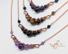 Handmade copper necklace: criss cross copper wire wrapped round stones - £25.99 GBP+
