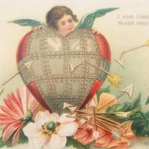 VTG 1908 Embossed Valentine Cupid Hiding Behind Armored Heart Floral Postcard - £11.00 GBP