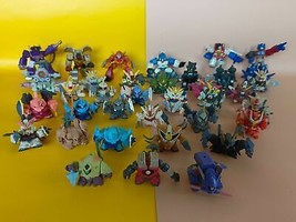 Lotto di 33 figure vintage di Transformers, Gundam e Robot 2-6 cm. Ultim... - $143.69
