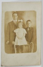 RPPC 1908 Two Young Men with Darling Little Girl Big Hair Bow Postcard R4 - £4.68 GBP
