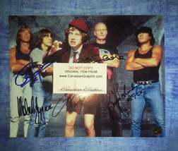 AC/DC Hand Signed Autograph Photo Angus Young, Malcolm Young, Brian Johnson, Cli - £319.68 GBP