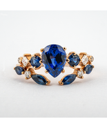 Luxurious Pear Lab Sapphire With Moissanite Engagement Ring Set - $1,100.00+