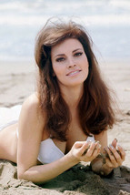 Raquel Welch lying on sand white bikini pin up 11x17 Mini Poster - £14.14 GBP