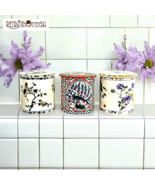 Set of 3 French 1940s cream tin jars with fine floral decorations - $1,269.07 MXN