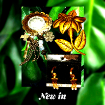 Jewelry lot collection~two brooches and one pair of earrings - $470.85 MXN