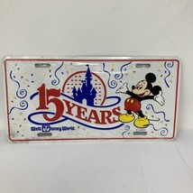 Vintage Walt Disney World 15 Years Metal Raised Graphics License Plate New - $28.04