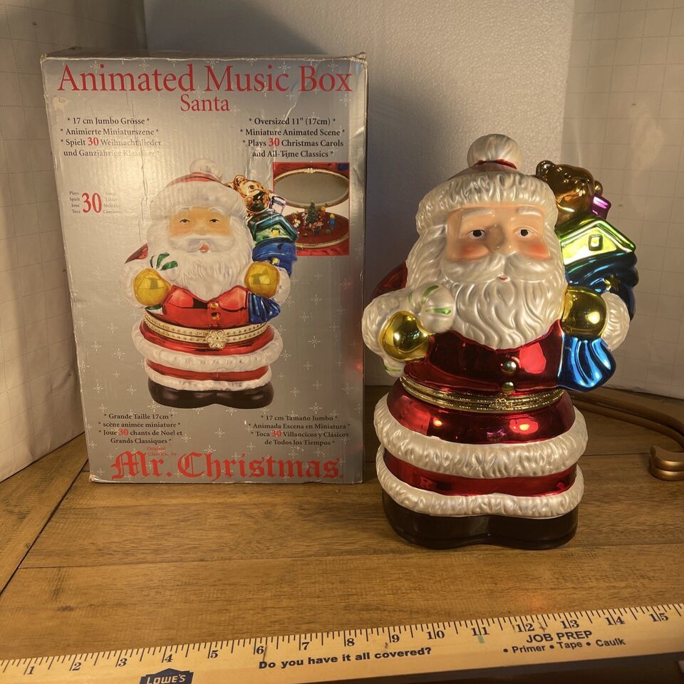 Mr. Christmas Animated Music Box Santa 11” tall plays 30 Christmas carols 2006 - $35.00