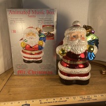 Mr. Christmas Animated Music Box Santa 11” tall plays 30 Christmas carol... - $35.00