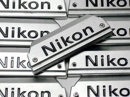 Genuine NEW NIKON FG Camera Chrome Front Name Plate Replacement Part w/Screws - £10.11 GBP
