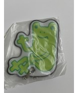 Frog sponge charm reflective material - $399.14 MXN
