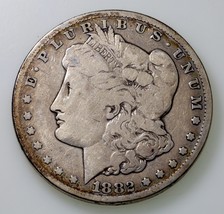 1882-CC $1 Silver Morgan Dollar in Good Condition, Full Rims, Gray Color - £118.72 GBP